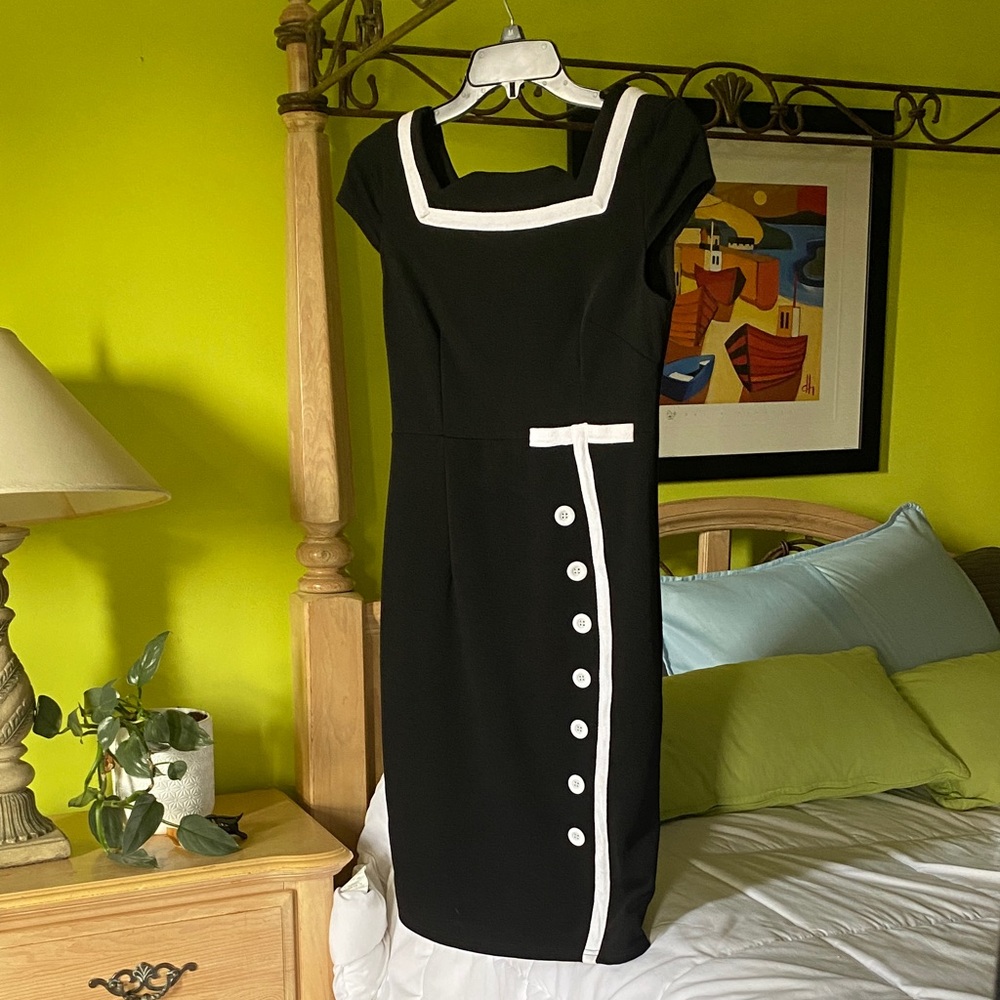 Chic Black Dress with White Trim